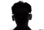 Teaser officiel RayNeo GT Max lunettes AR Dolby Vision premier modèle au monde certifié dynamic metadata, silhouette homme portant monture fine sur fond blanc avec logo Dolby Vision