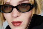 Lunettes Android XR Gentle Monster portées par une mannequin, monture ovale noire signée du designer coréen pour l'eyewear intelligent Google et Samsung lancé à l'automne 2026 avec Gemini